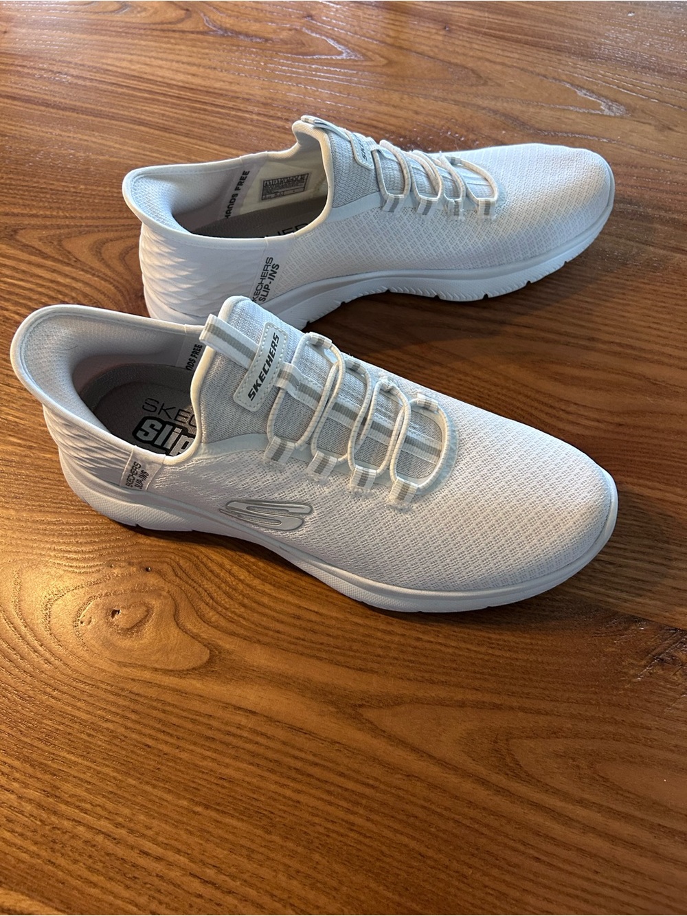 Skechers Men’s All-White Slip-On Knit Sneakers